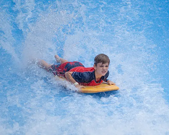 AQUA Wave M A surfing machine with a built-in water tank removes the need for a concrete pool or civil work for water storage.
